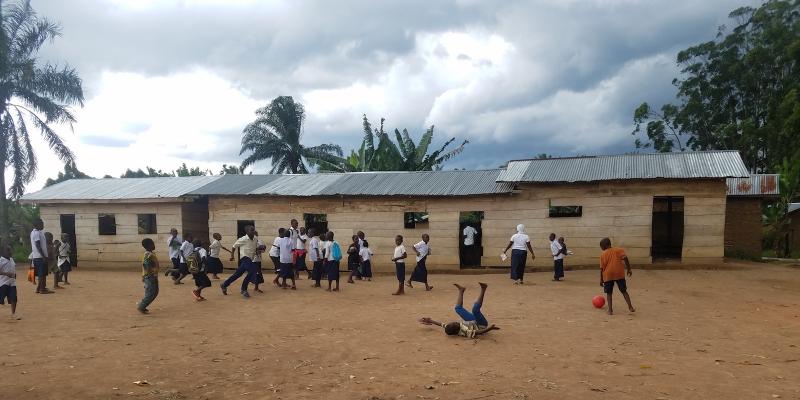 Children playing outside their school