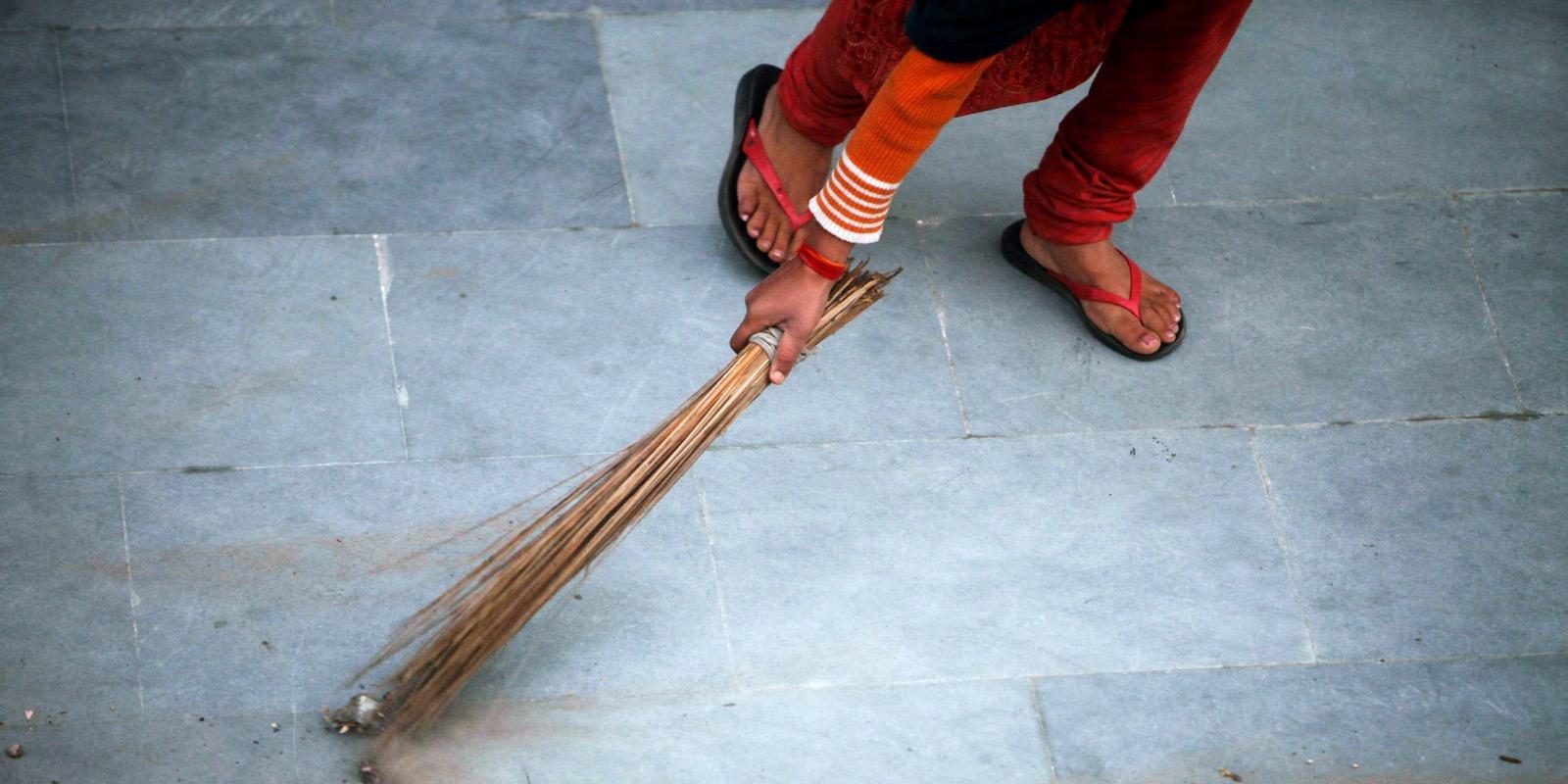 Girl sweeping