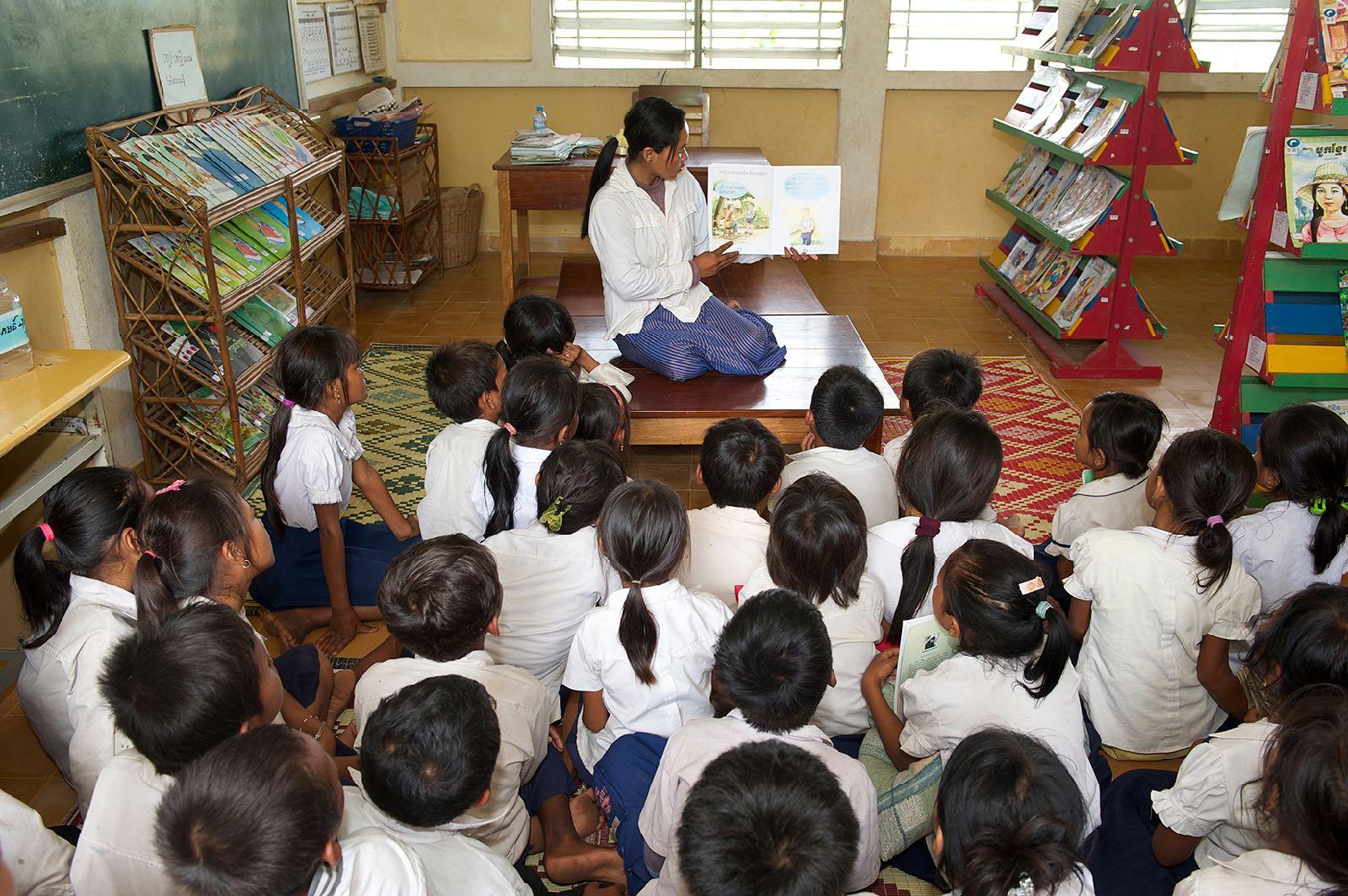 Children gather in library in floating village