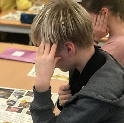 Girl reading the Globe