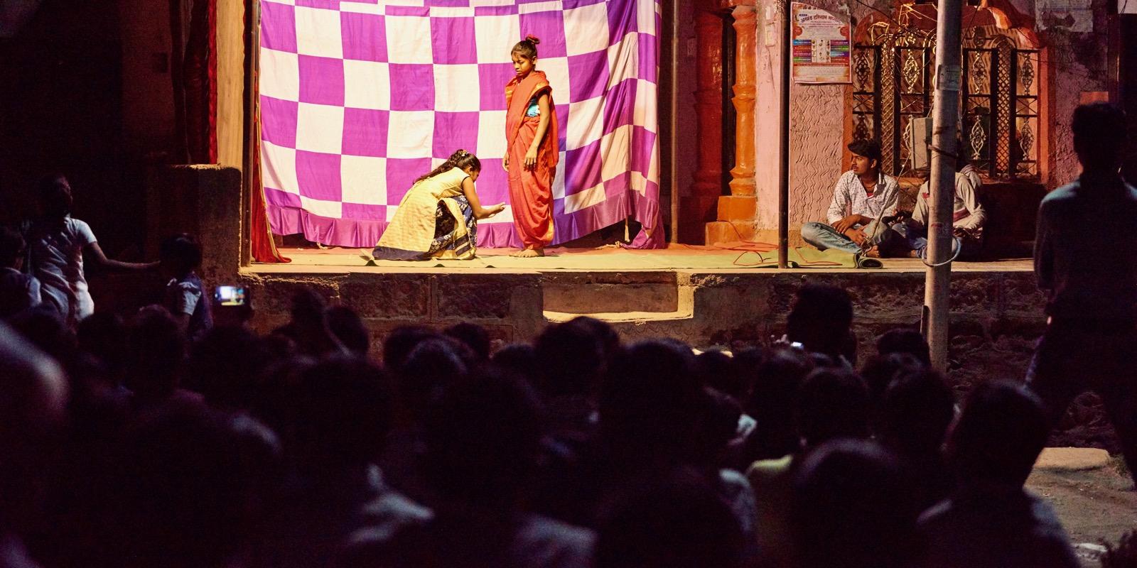 two girls performing in a play