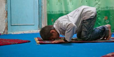 Boy praying.