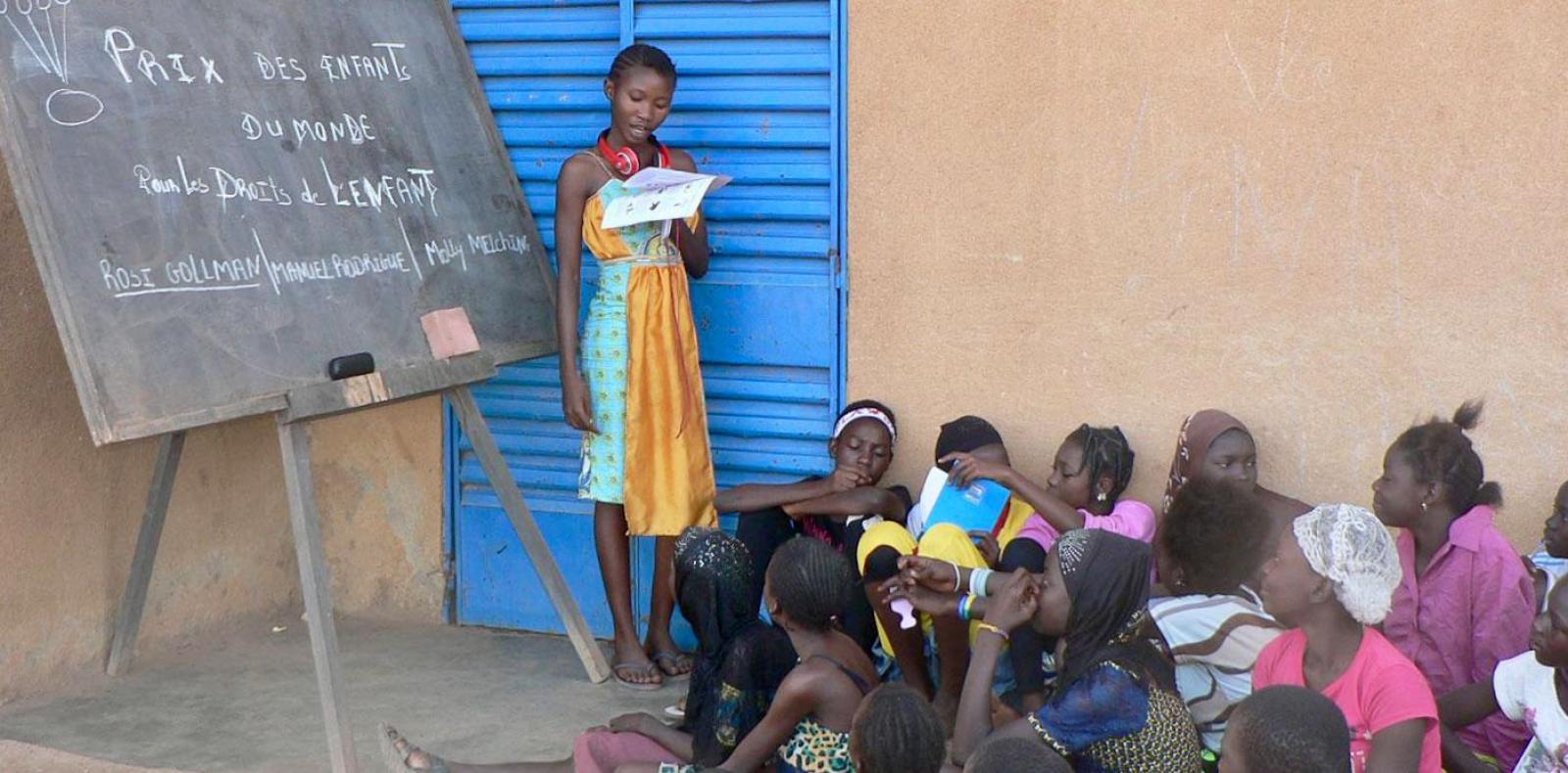 Girl teaches child rights to village children