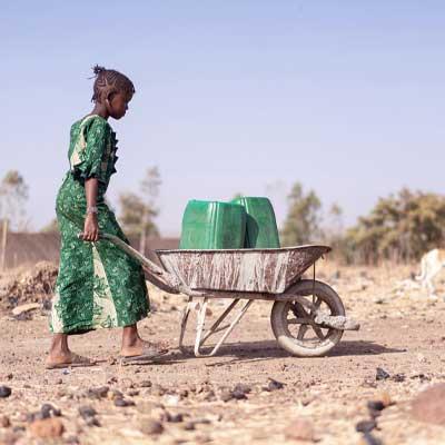 Girl fetching water.