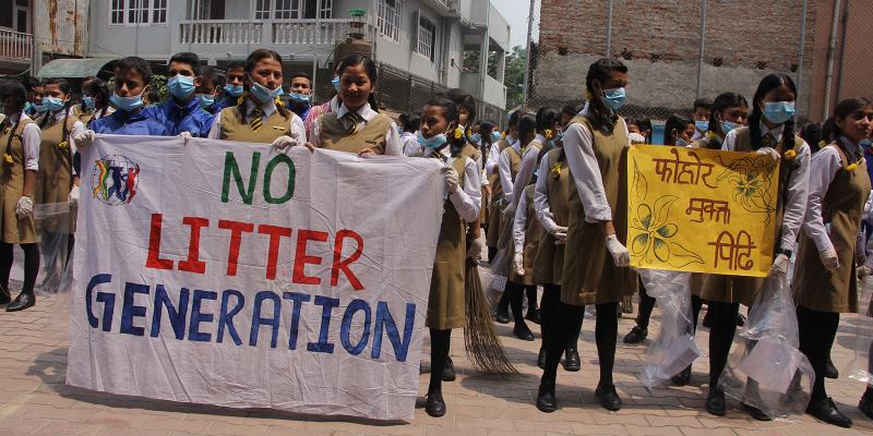 School children in India holding NO LItter Generation signs