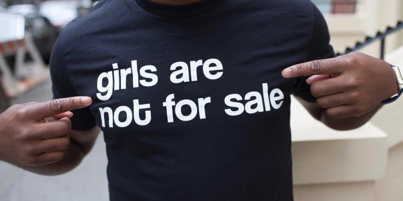 Man with t-shirt with text: Girls are not for sale
