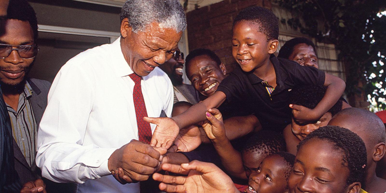 Nelson Mandela with children