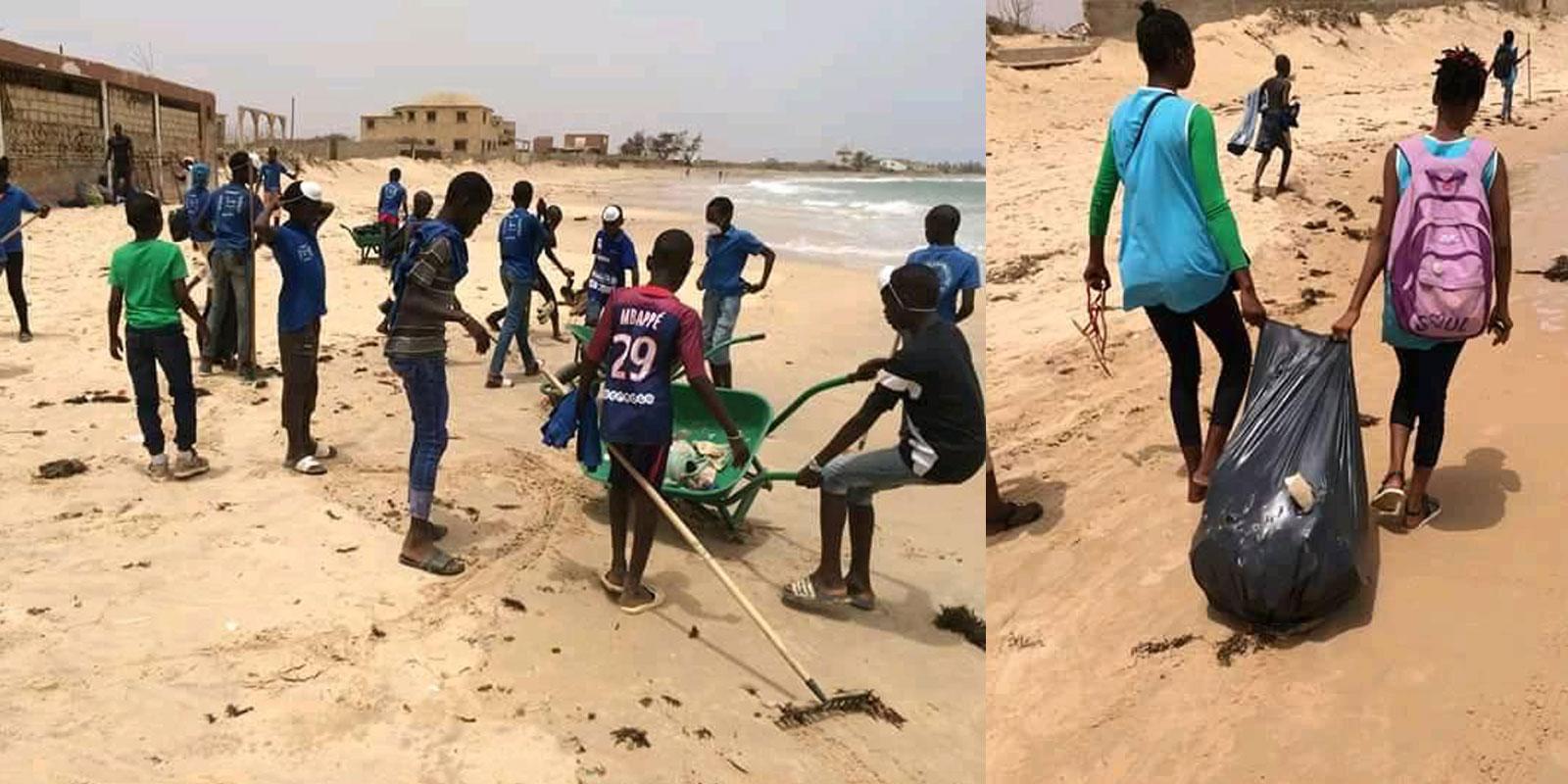 Children collecting litter on beach