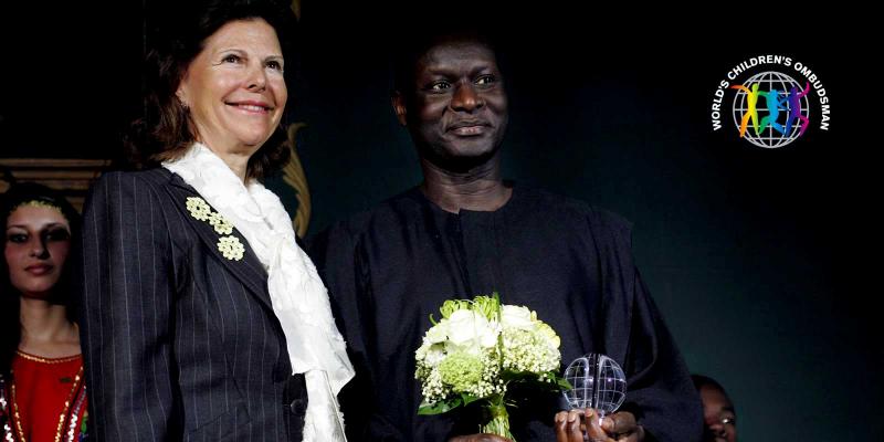 Olara Otunno and HM Queen Silvia 