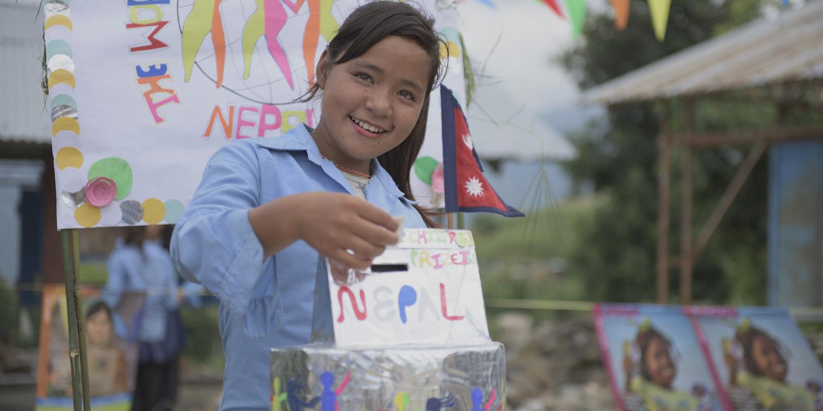 Phulmaya, a girl from Nepal, casts her vote