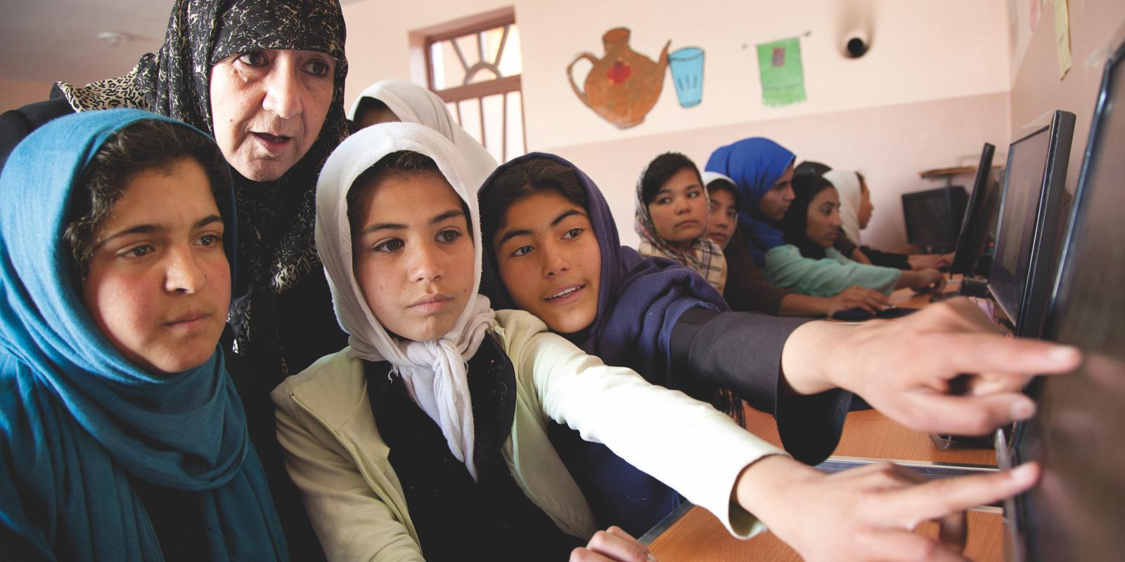Sakena Yacoobi with girls in the classroom, Afghanistan.